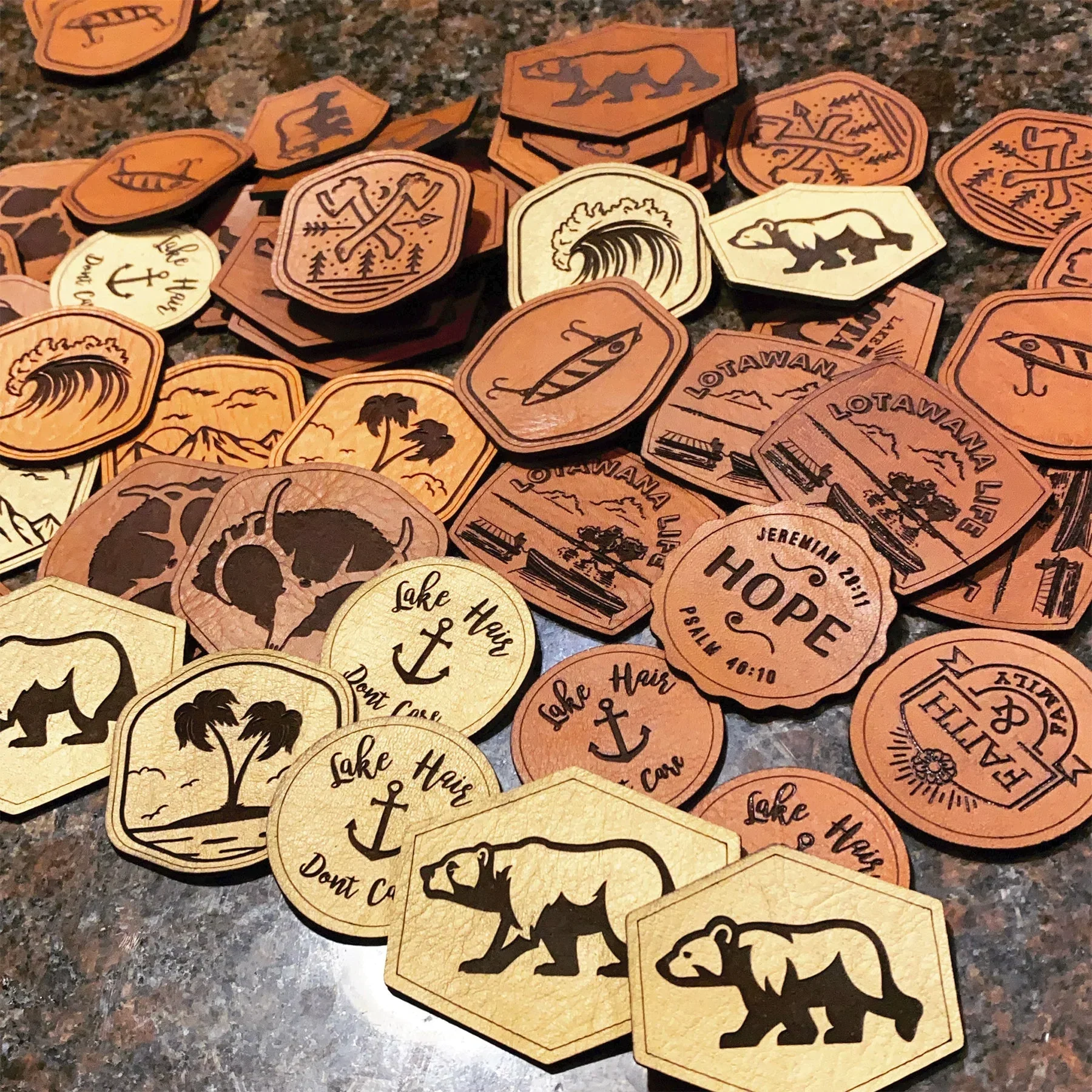 Laser cut leather badging